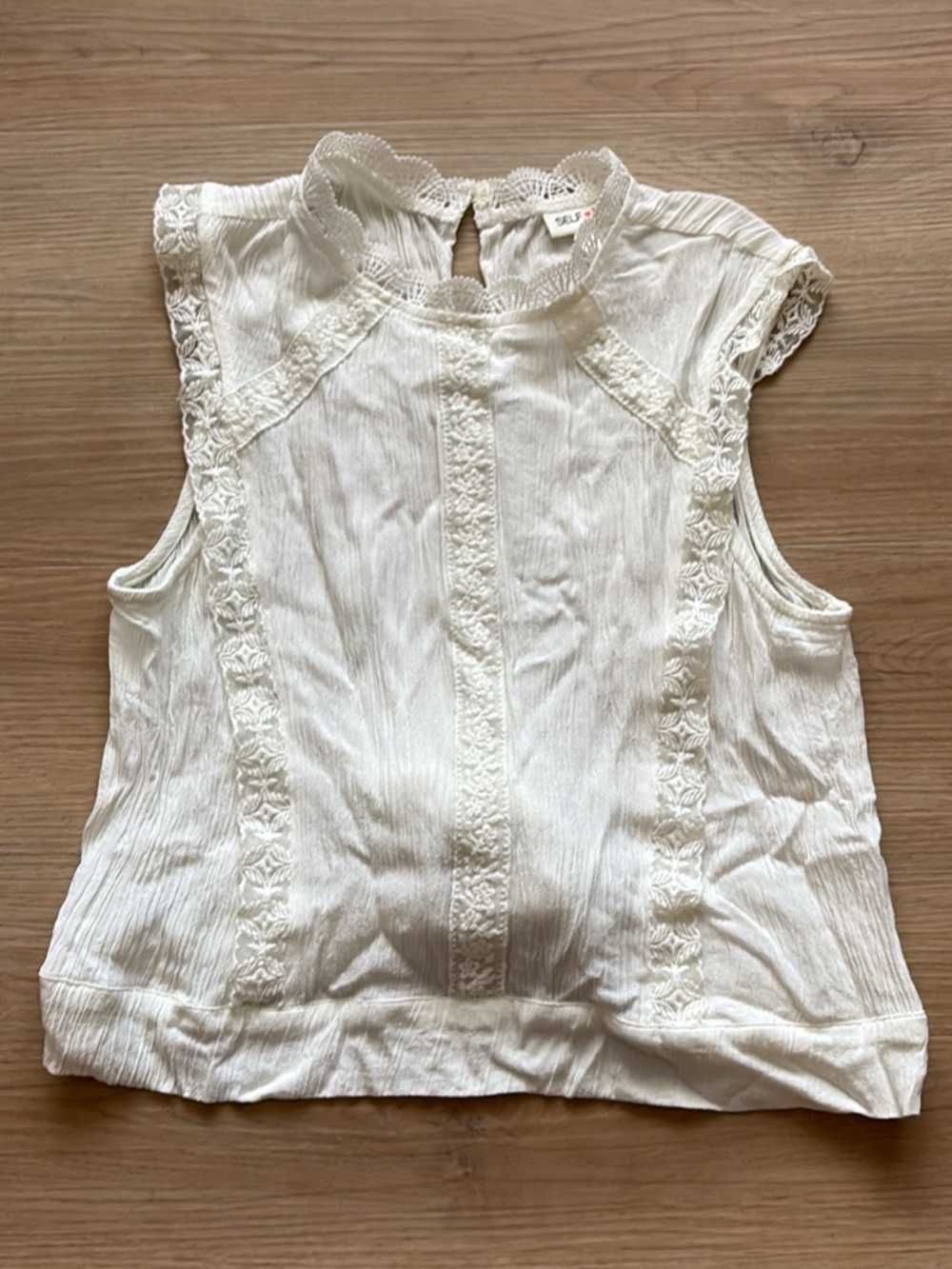 Chic Lace-Trimmed Sleeveless Blouse
